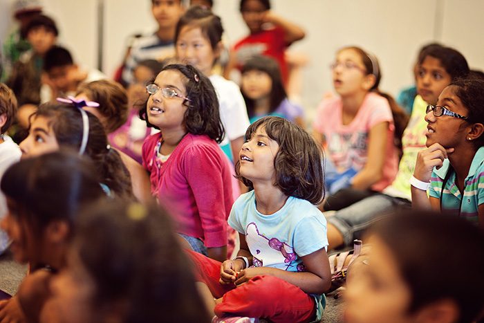 Campers at Steve and Kate’s Camp in Fremont watching a performance