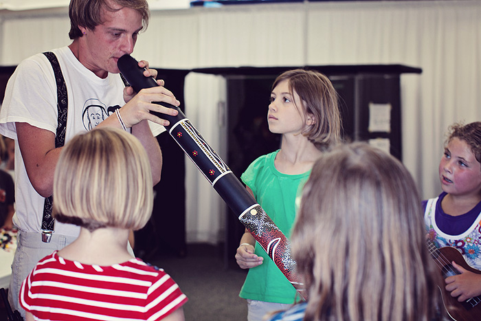 Recording Specialist in Kentfield playing didgeridoo for campers at Steve and Kate’s Camp